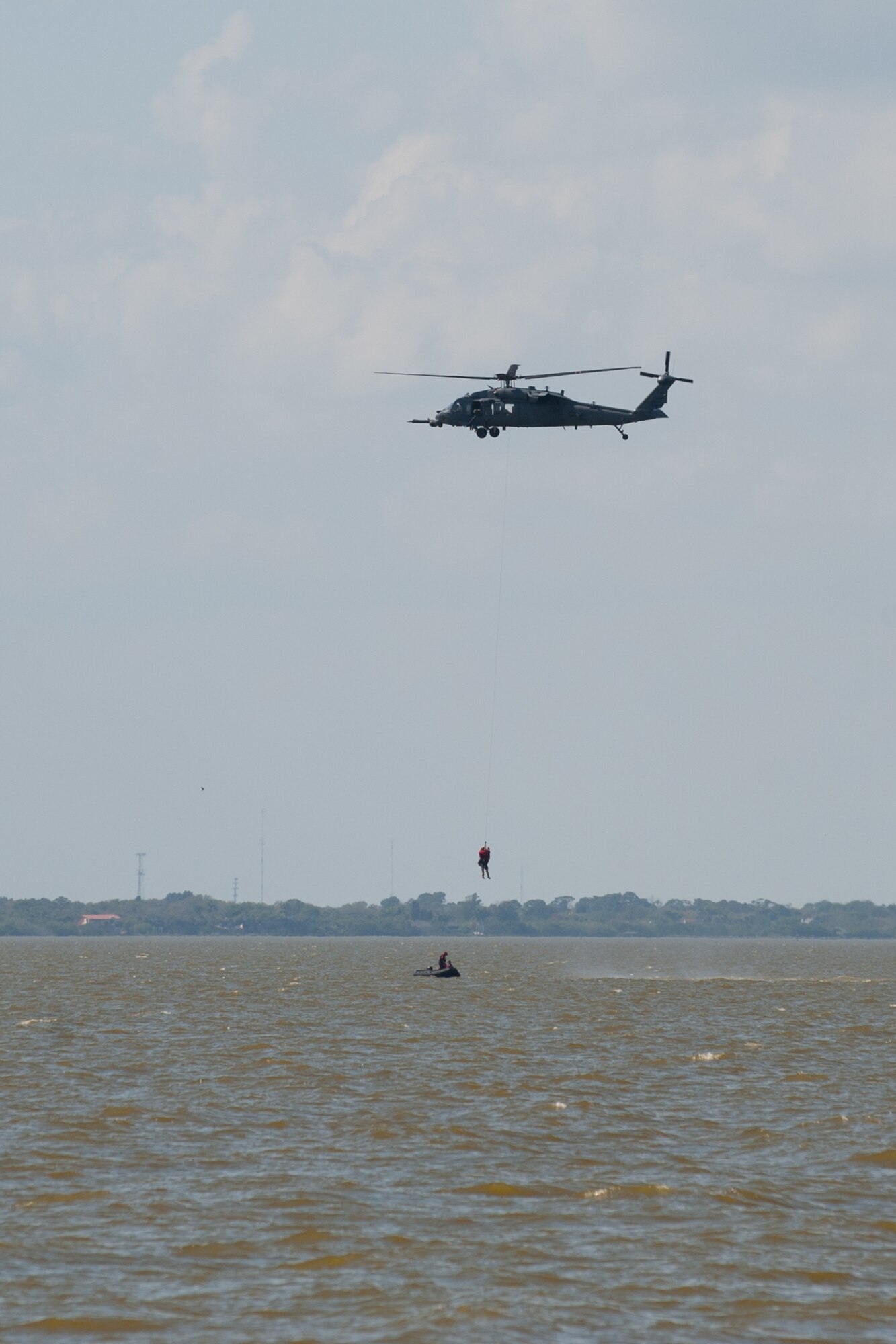 The 45th Operations Group's Detachment 3 and the 920th Rescue Wing held an astronaut recovery demonstration March 14, 2016, along the Banana River, west of Patrick Air Force Base, Fla. The demonstration involved Air Force Guardian Angel Airmen and aircraft of the 920th Rescue Wing to showcase aspects of safe rescue operations. Airmen from Detachment 3 coordinate astronaut capsule rescue and recovery and train personnel worldwide to ensure the Department of Defense is ready to support NASA's human space endeavors. (U.S. Air Force photo by Benjamin Thacker/Released)