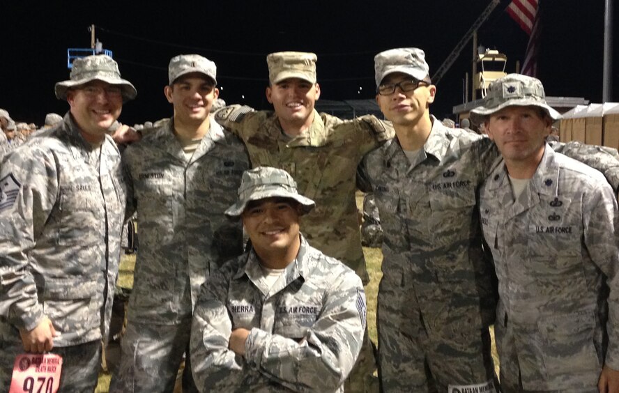 2nd Lt. Christian Erneston, second from the left, poses with his team at last year's Bataan Memorial Death March. Erneston has again organized a team of participants to travel to White Sands Missile Range to compete in the trek on March 20.  In preparation to compete in one of the hardest marathon-length routes in the U.S., since January Erneston and his team members have gone on weekend hikes of increasing distances and difficulty, including an 18-mile hike with weighted rucksacks. (Courtesy photo)