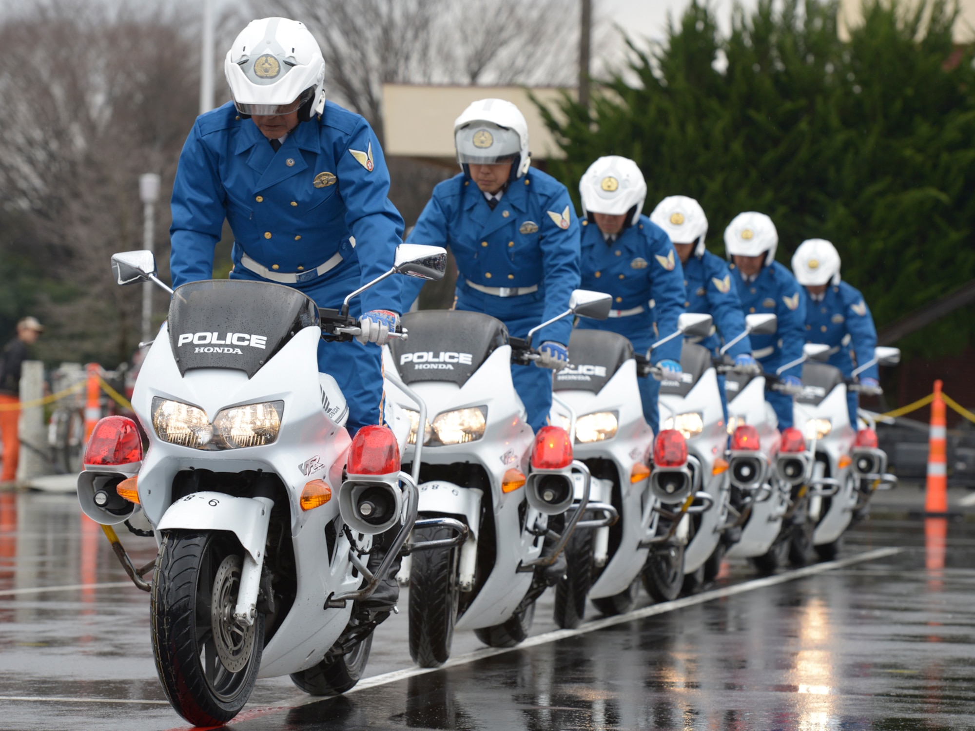 Members from the Metropolitan Police Department 9th district traffic mobile unit perform motorcycle demonstration during the safety festival 2016 at Yokota Air Base, Japan, March 11, 2016. The 374th Airlift Wing safety office provided Yokota residents with various events such as the Metropolitan Police Department motorcycle unit and traffic safety demonstrations, earthquake and smoke house information, firefighting and fire ladder trucks experience, seatbelt simulator and child car seat checks. (U.S. Air Force photo by Machiko Imai/Released)