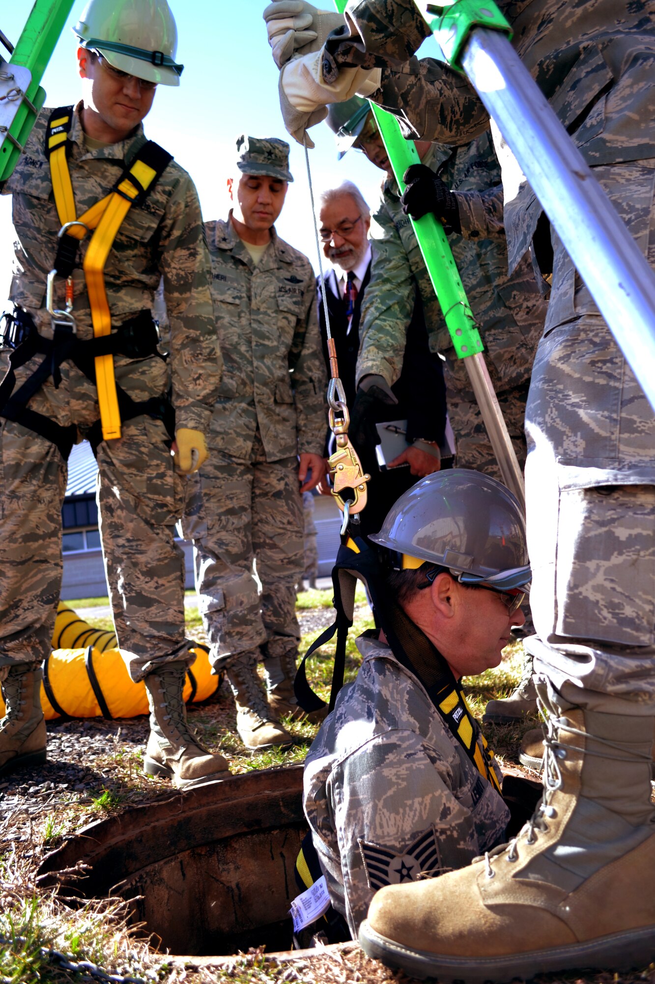 Brig. Gen. Michael R. Taheri, the Commander of the Air National Guard Readiness Center, Joint Base Andrews, Maryland, watches a 270th Engineering Installation Squadron training exercise at Horsham Air Guard Station, Pa., March 12, 2016. The 270th EIS had multiple superior performers who received coins from the general during his visit here. (U.S. Air National Guard photo by Tech. Sgt. Andria Allmond)