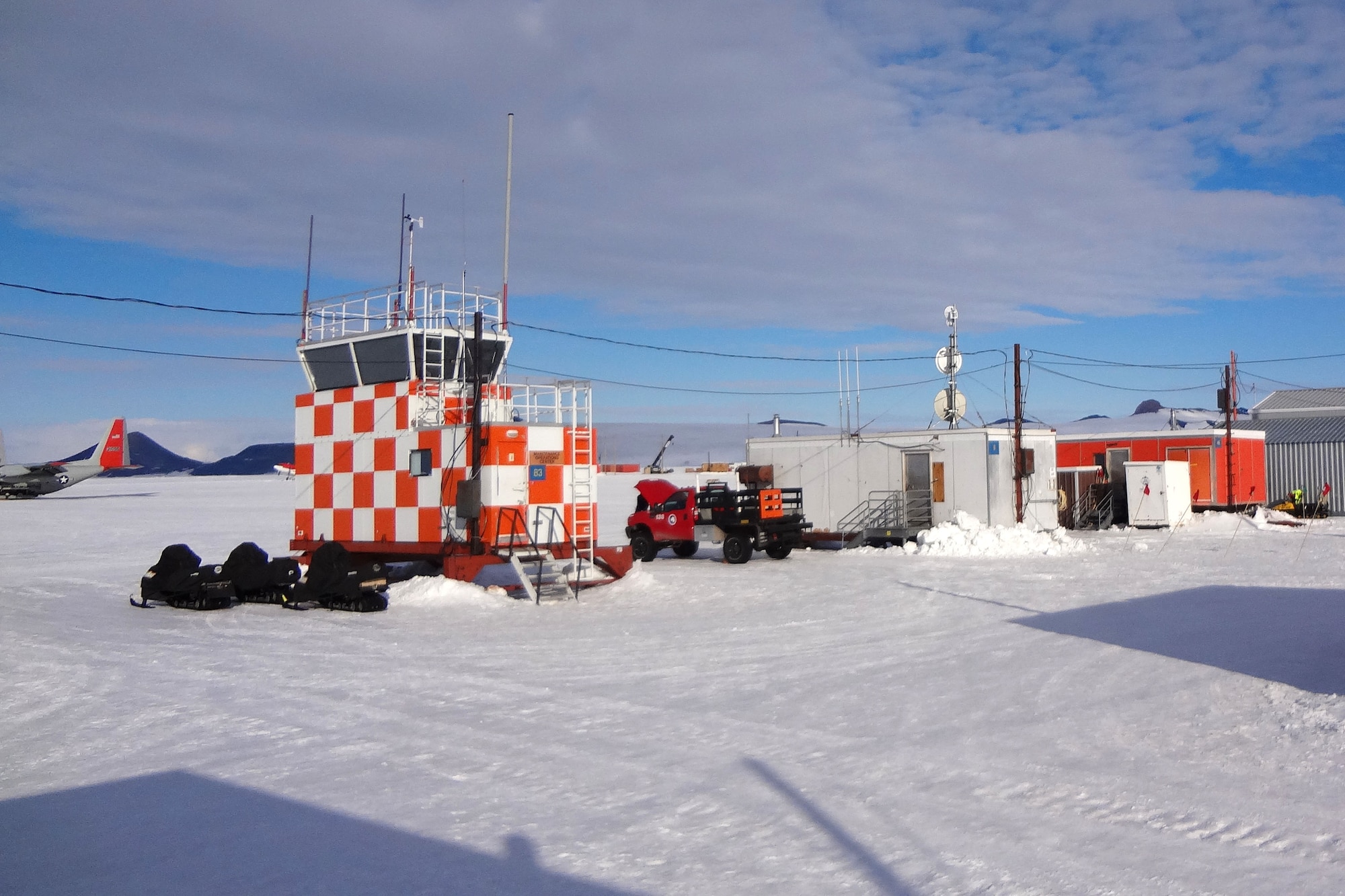 Operation Deep Freeze is the United States Military’s support of the U.S. Antarctic Program led by the National Science Foundation. McMurdo Station is a U.S. Antarctic research center in Antarctica which serves as central hub for operations. The station is the largest community in Antarctica, capable of hosting more than 1,000 residents. The New York Air National Guard’s special ski-equipped LC-130 Hercules aircraft are the primary means of transportation to and from the station from the rest of the world. Military crews operating the LC-130s are able to perform air drops to remote locations, re-supply research stations, transport passengers and anything else the NSF scientists require to adequately complete their job. (U.S. Air National Guard photo by Tech. Sgt. Toni Donahee)