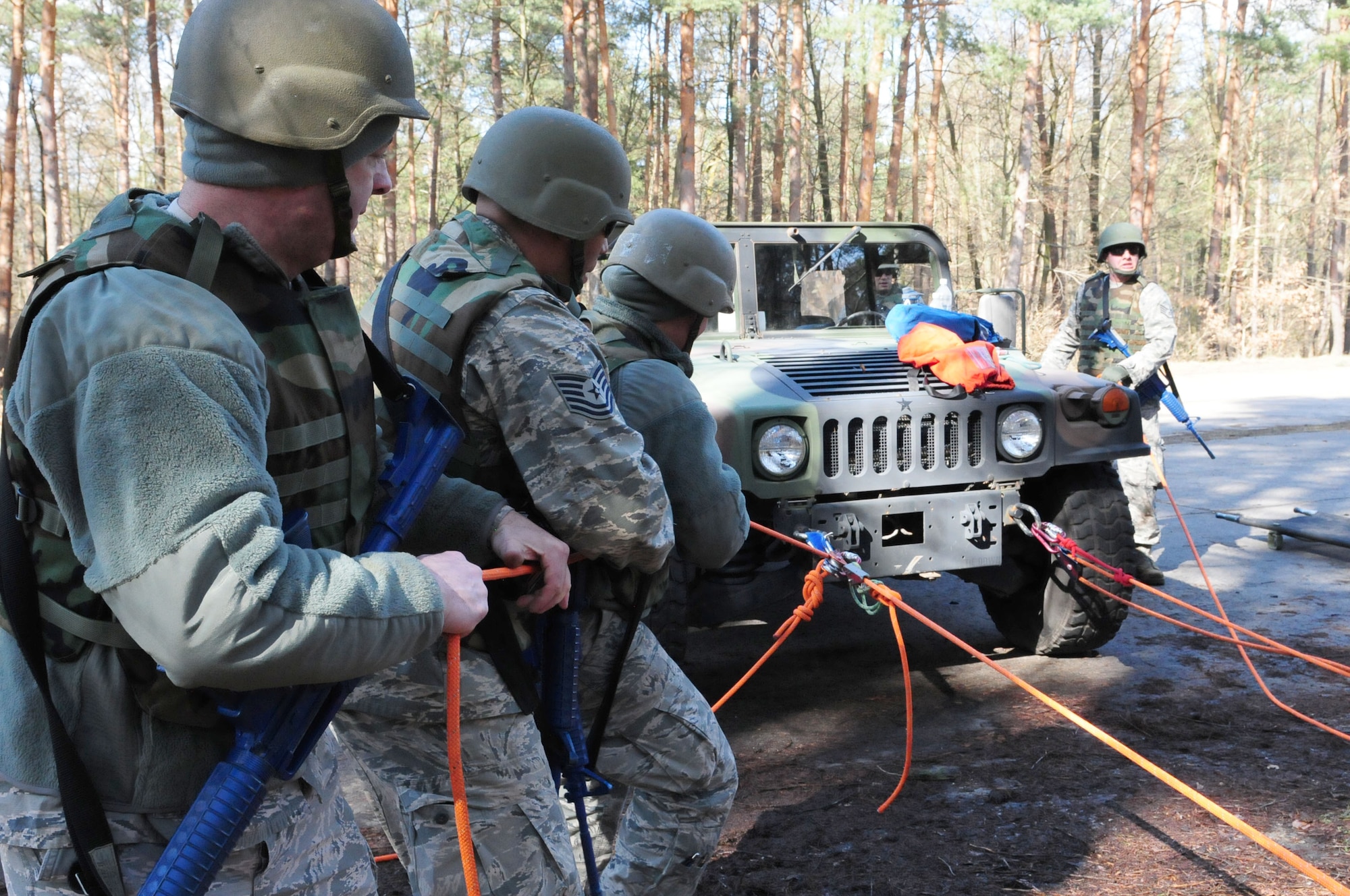 175th Fire and Emergency Services members perform a search and rescue exercise during Silver Flag 2016 at Ramstein Air Base, March 9. Silver Flag is an every 36 months required training for Air Force civil engineer specialties. (U.S. Air National Guard photo/ Senior Airman Erica Rodriguez)