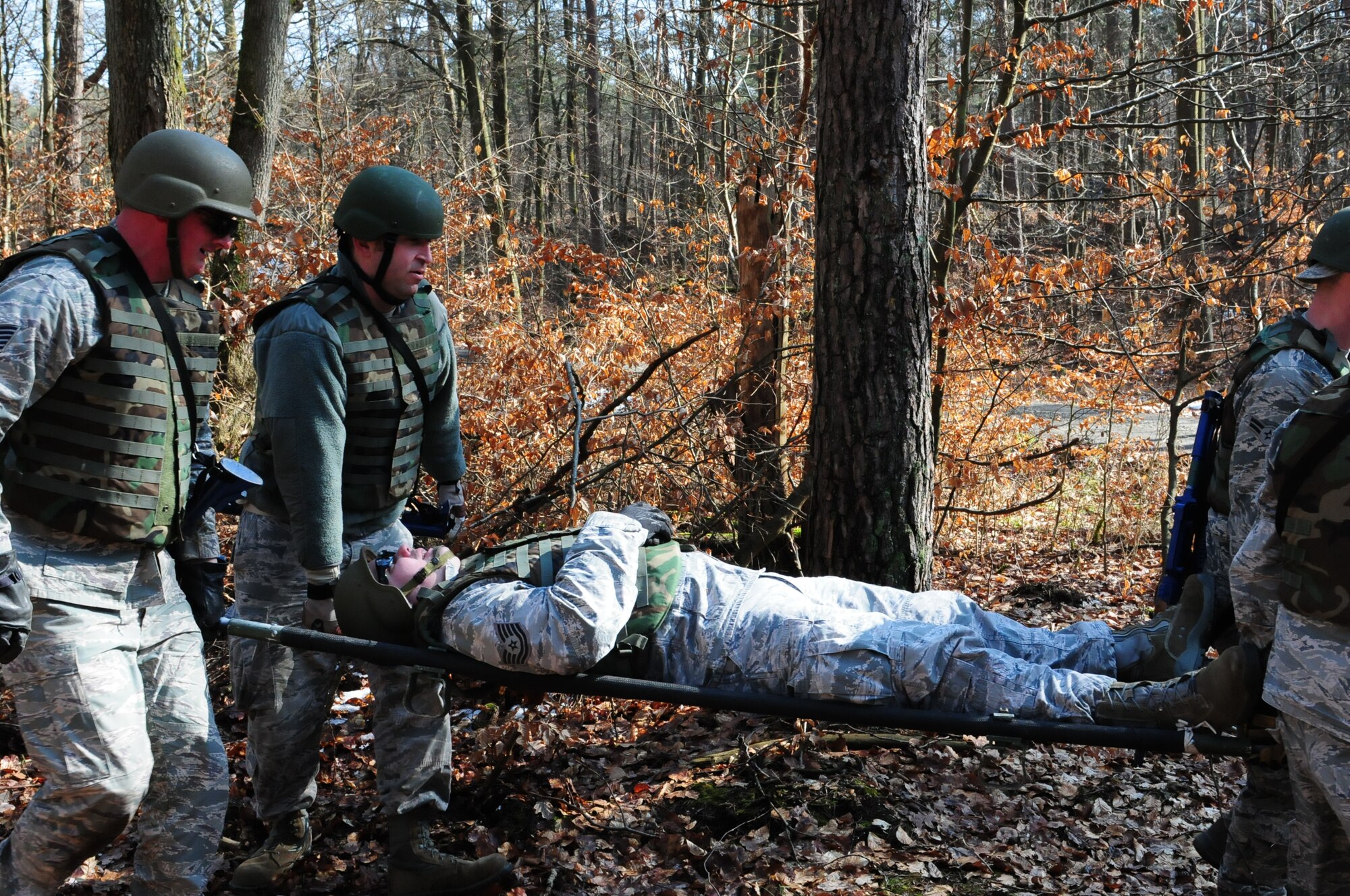 175th Fire and Emergency Services members perform a search and rescue exercise during Silver Flag 2016 at Ramstein Air Base, March 9. Silver Flag is an every 36 months required training for Air Force civil engineer specialties. (U.S. Air National Guard photo/ Senior Airman Erica Rodriguez)