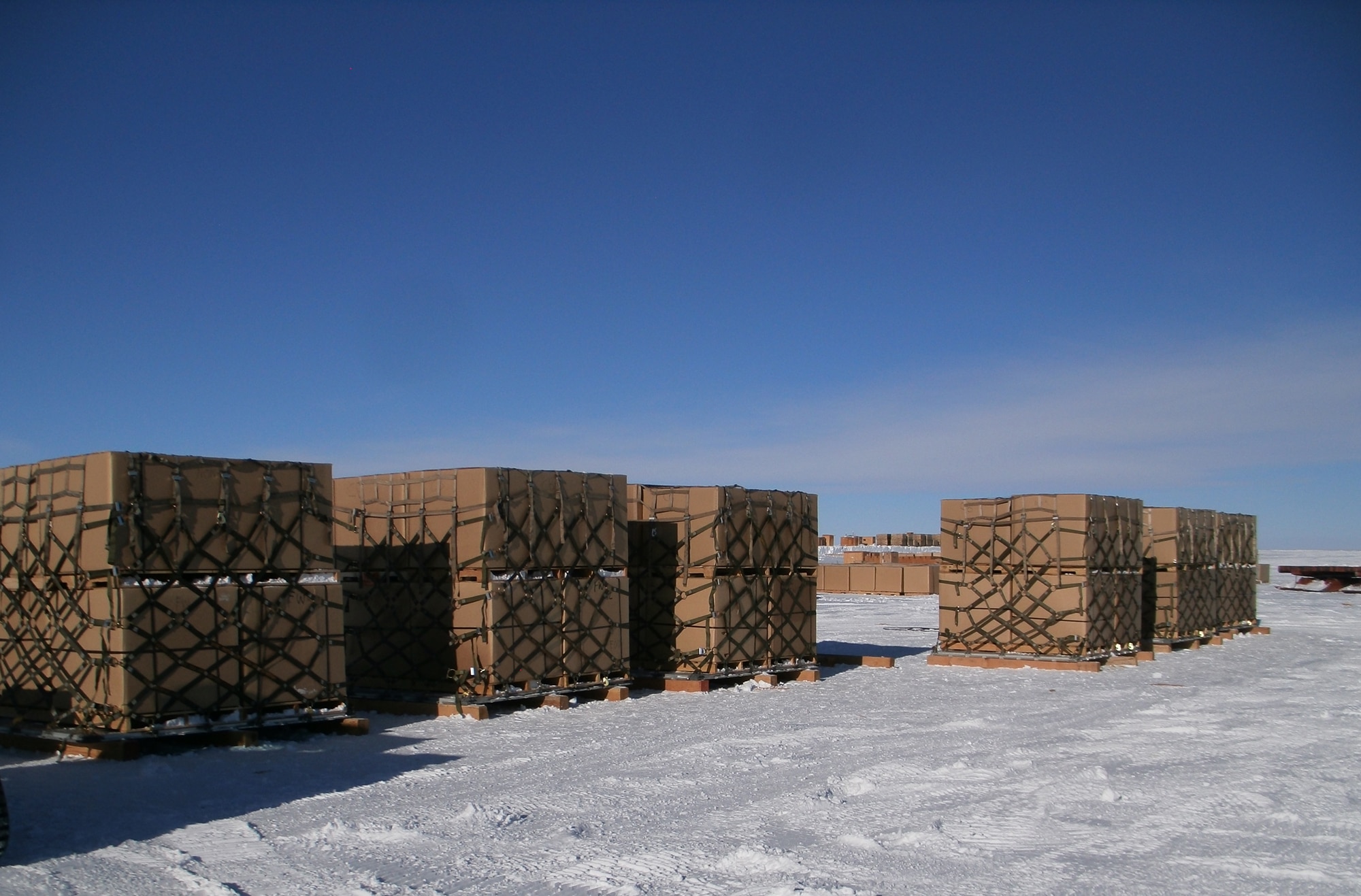 Three Airmen with the 109th Airlift Wing were tasked to build and inspect pallets of excess and obsolete materials in January 2016 currently stored at the South Pole. The team built 73 pallets in 11 days. (Courtesy photo)