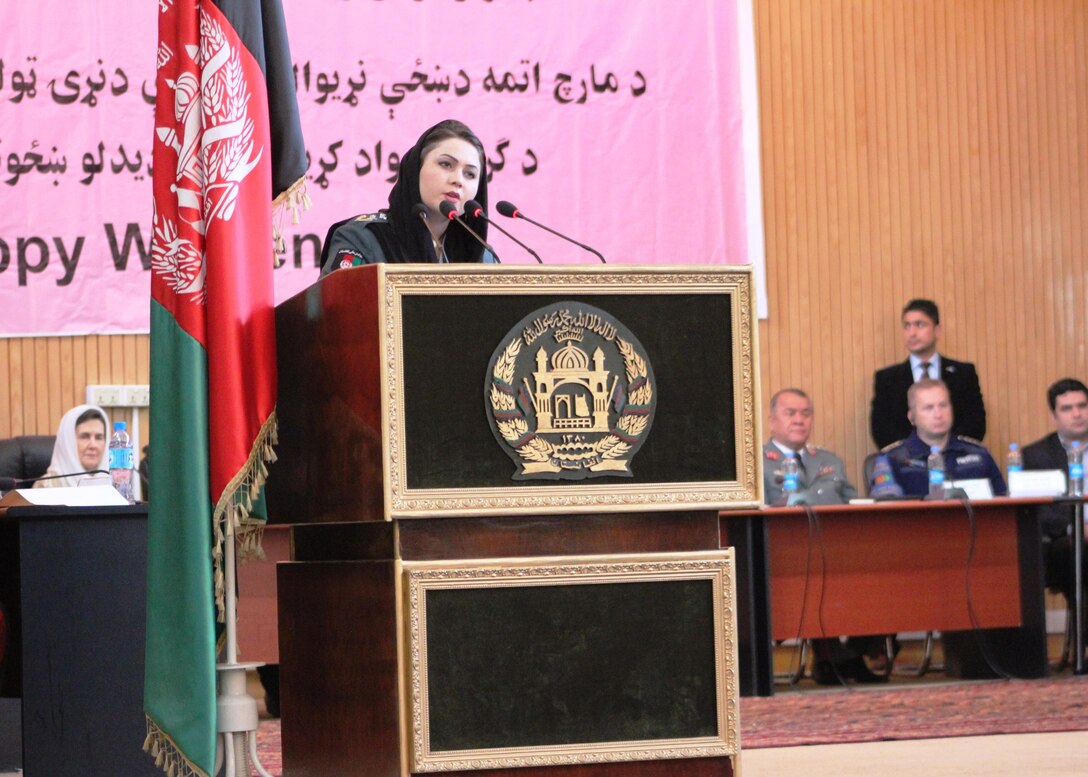 A member of the Afghan National Police provides opening remarks during the Ministry of the Interior International Women’s Day celebration in Kabul, Afghanistan, March 13, 2016. The event honored women’s contributions to the Afghan National Police and Security Forces, and highlighted the way forward for women’s rights in Afghanistan. Navy photo by Lt. Charity Edgar