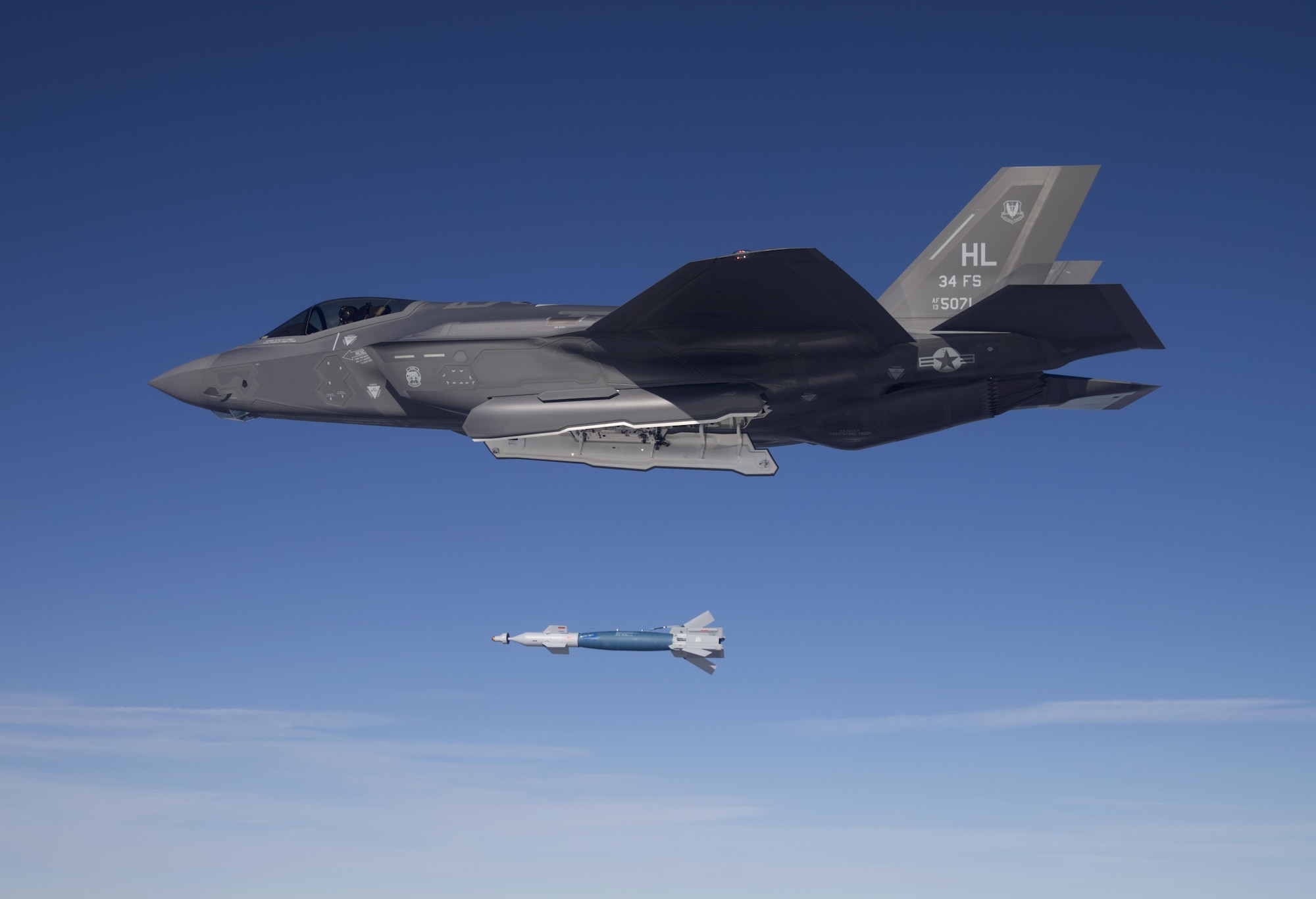 Lt. Col. George Watkins, 34th Fighter Squadron commander, drops a GBU-12 laser-guided bomb from an F-35A Lightning II at the Utah Test and Training Range Feb. 25, 2016. The 34th FS is the Air Force's first combat unit to employ munitions from the F-35A. (U.S. Air Force photo/Jim Haseltine)
