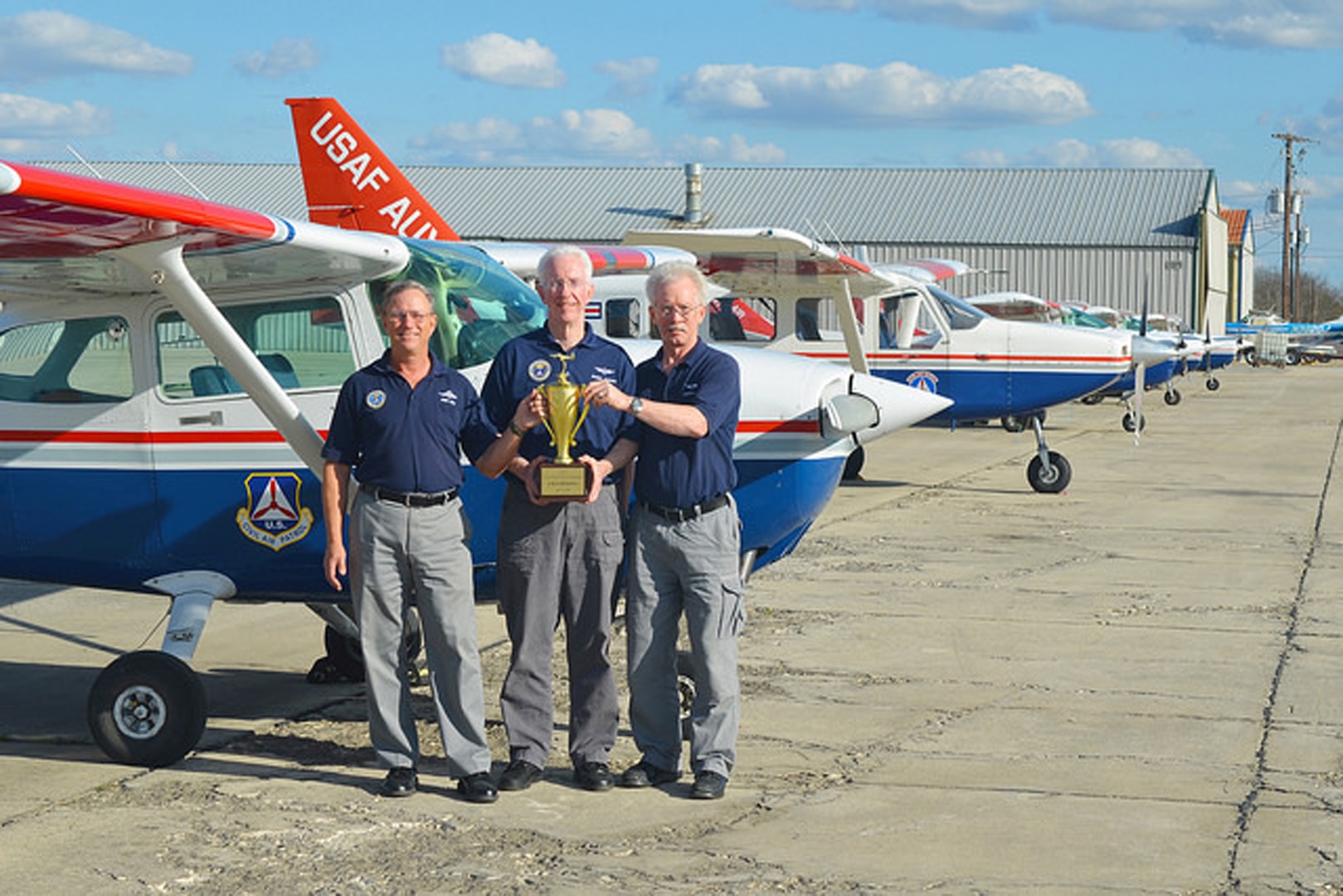 From left: Mike Duc, Roger Corbin and Jan Wagner display the first-place trophy they earned at the Civil Air Patrol Texas Wing Flight Competition Feb. 28 in San Marcos.