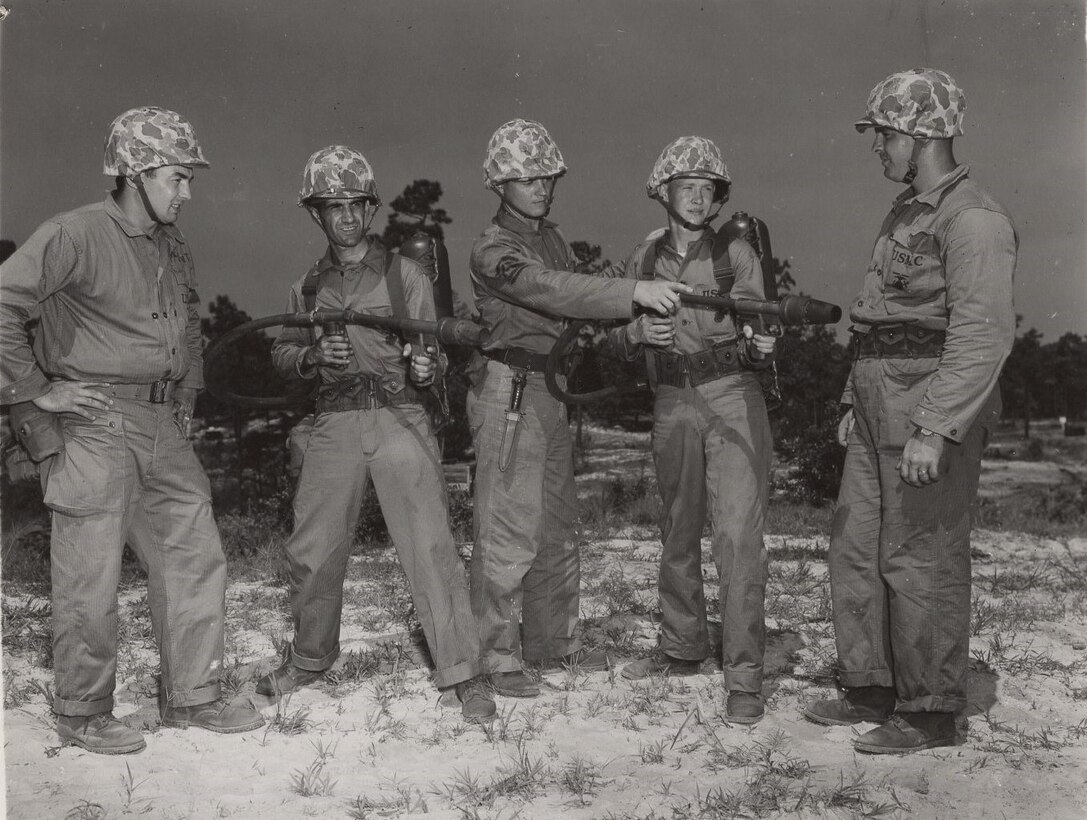Flamethrower Instruction, c. 1944. Marines receive instruction on the function of the M2-2 flamethrower.