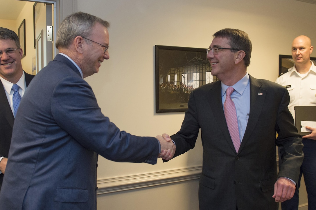 Defense Secretary Ash Carter, right, greets Eric Schmidt, chairman of the new Defense Innovation Advisory Board, before a meeting at the Pentagon, March 14, 2016. Schmidt also is executive chairman of Alphabet, Google's parent company. The board's mandate is to provide department leaders independent advice on innovative and adaptive means to address future organizational and cultural challenges. DoD photo by Air Force Senior Master Sgt. Adrian Cadiz