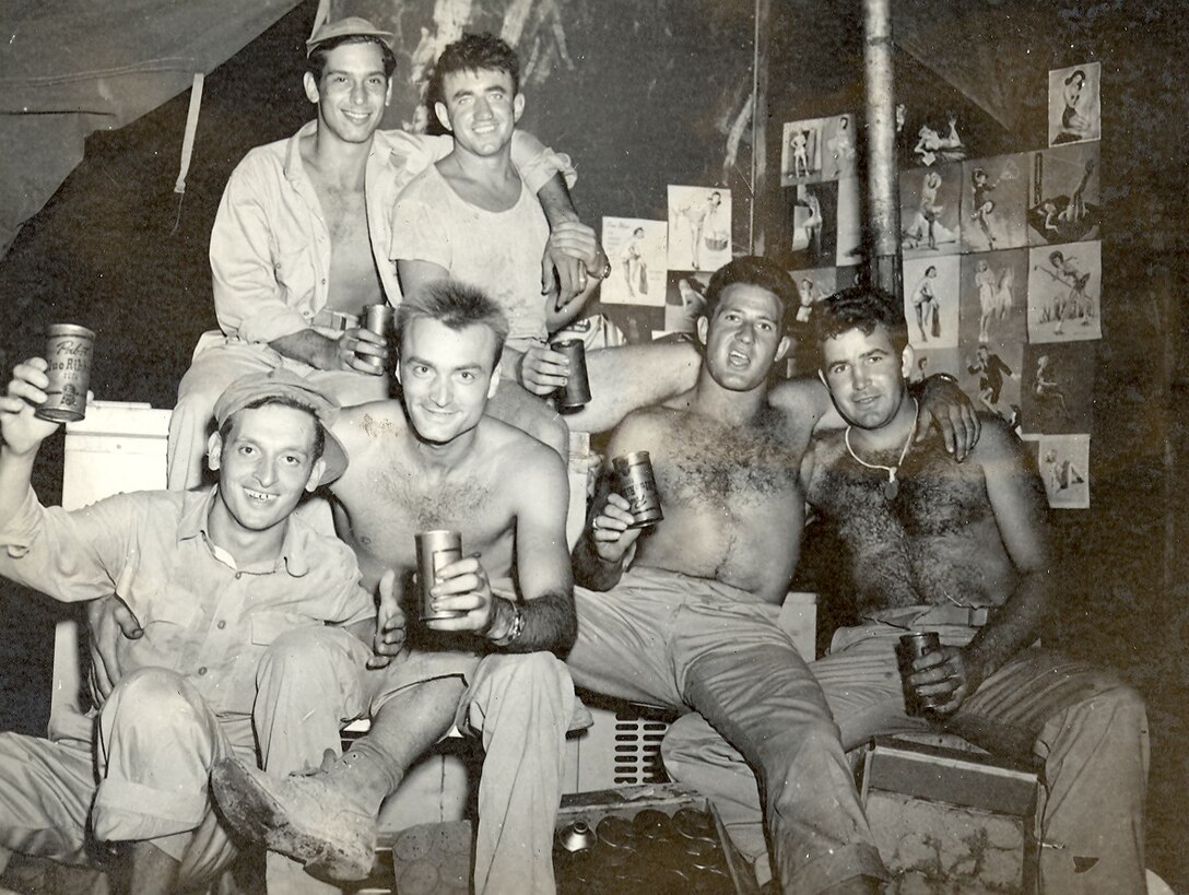 33rd Marine Aircraft Group, Okinawa, Japan, April-May 1945. Marines enjoy their down-time with a case of beer.