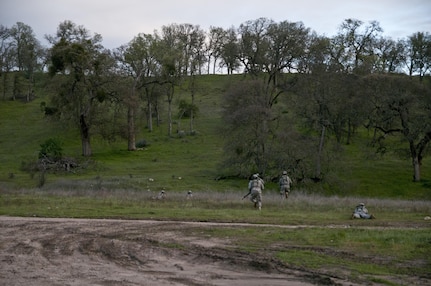 U.S. Army Reserve Soldiers react to contact during Combat Support Training Exercise 78-16-01 at Fort Hunter Liggett, Calif. Nearly 40 units from the U.S. Army Reserve, U.S. Air Force and Canadian Armed Forces trained at Joint Base McGuire-Dix-Lakehurst, N.J., Fort Knox, Ky and Fort Hunter Liggett, Calif., as part of the 84th Training Command's CSTX 78-16-01. This exercise marks the first CSTX of 2016 and is hosted by the 78th Training Division. (U.S. Army photo by Staff Sgt. Debralee Best)