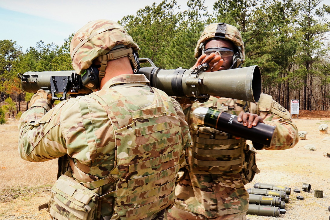 Army Pfc. Akintunde L. Ola, right, loads a round into a Carl Gustav M3 84 mm recoilless rifle during a live-fire certification course on Fort Bragg, N.C., March 9, 2016. Ola is an infantryman is assigned to the 82nd Airborne Division’s Company D, 2nd Battalion, 504th Parachute Infantry Regiment, 1st Brigade Combat Team. Army photo by Sgt. Juan F. Jimenez