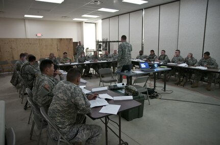 U.S. Army Reserve lieutenants attend a class to prepare them for an officer development competition of finding the military load classification of a Bailey bridge and surrounding area at Fort Hunter Liggett, Calif., during Combat Support Training Exercise 78-16-01. Nearly 40 units from the U.S. Army Reserve, U.S. Air Force and Canadian Armed Forces trained at Joint Base McGuire-Dix-Lakehurst, N.J., Fort Knox, Ky. and Fort Hunter Liggett, Calif., as part of the 84th Training Command's CSTX 78-16-01. This exercise marks the first CSTX of 2016 and is hosted by the 78th Training Division. (U.S. Army photo by Staff Sgt. Debralee Best)