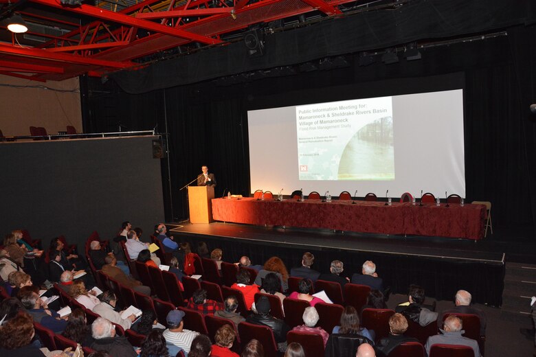 Matthew Cosby presenting- Matthew Cosby, project manager, U.S. Army Corps of Engineers, New York District, gives a presentation on the Mamaroneck and Sheldrake Rivers Basin Flood Risk Management Study elaborating on the tentatively plan selected project features and the path moving forward during the Public Information Meeting, Mamaroneck, N.Y., February 25, 2016. The U.S. Army Corps of Engineers, in partnership with New York State Department of Environmental Conservation, Westchester County, and Village of Mamaroneck held a Public Information Meeting to inform the community of  Mamaroneck about the potential  alternative plan selected for the Mamaroneck and Sheldrake Rivers Basin Flood Risk Reduction Project.(photo by: Hector Mosley, public affairs, New York District)