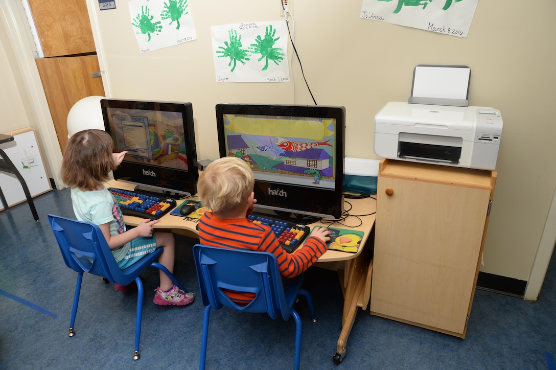 Children log-on and play games using a computer system while at the Pre-K Child Development Center recently. The students learned to navigate computer systems while playing games on the equipment.