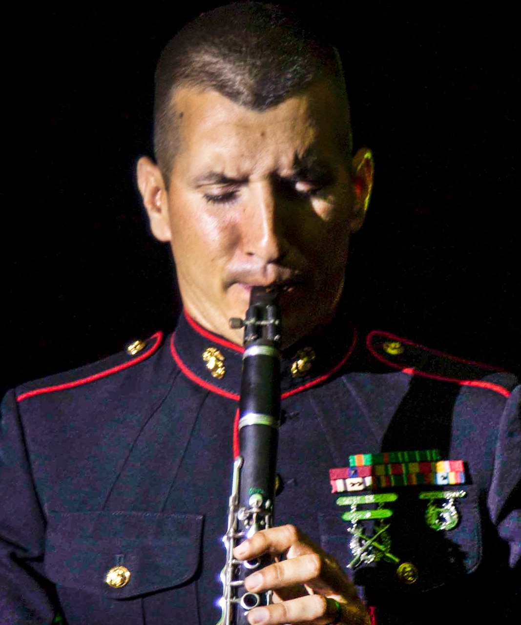 Clarinetist Sgt. Justin Grunes, a musician with Marine Corps Band San Diego aboard Marine Corps Recruit Depot San Diego, Calif., has spent time in the Marine Corps and the Army Reserves, and earned his degree in music performance from the University of Delaware.  He couldn’t resist the call, and was drawn back to the Marine Corps to live out his dream as one of the few and proud, and a professional musician.  Grunes has been performing with the Marine Corps bands for a total of 9 years.