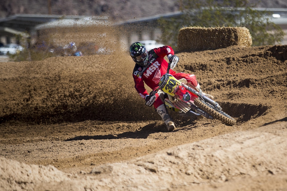 A motocross rider makes a sharp turn at the Motocross Jam Fest aboard the Combat Center March 12, 2016. The event, hosted by Marine Corps Community Services, included concession stands, motorcycle stunt performances by professional motocross riders, and live rock music from Boston-based band, Lansdowne. (Official Marine Corps photo by Lance Cpl. Levi Schultz/Released)