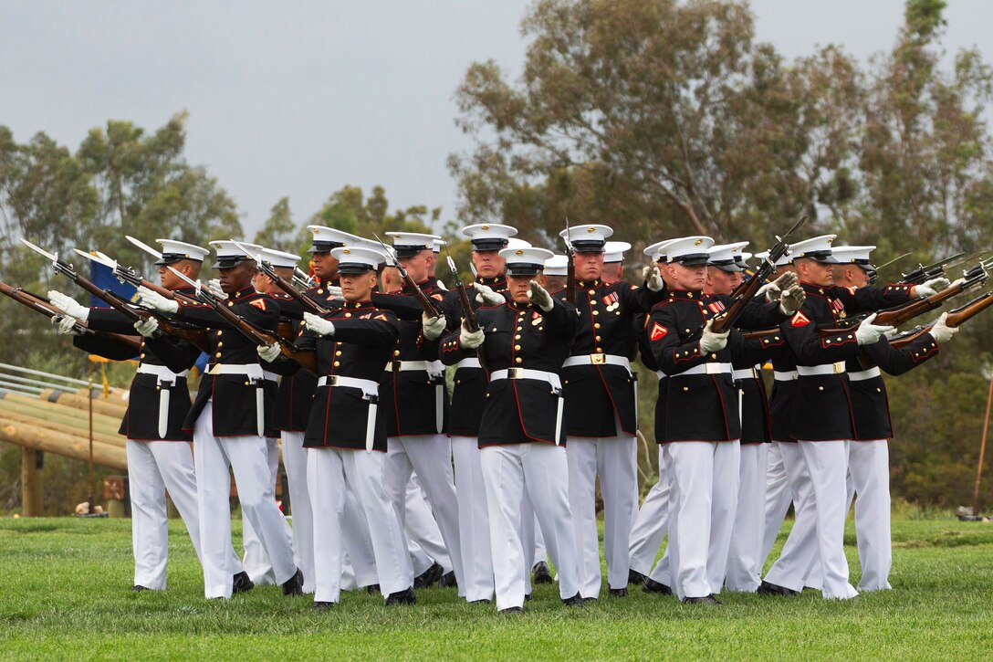 Marines with the Silent Drill Platoon perform on Marine Corps Air Station Miramar, Calif., March 11, 2016. Their performance was part of the Battle Color Ceremony at the air station. U.S. Marine Corps photo by Sgt. Lillian Stephens
