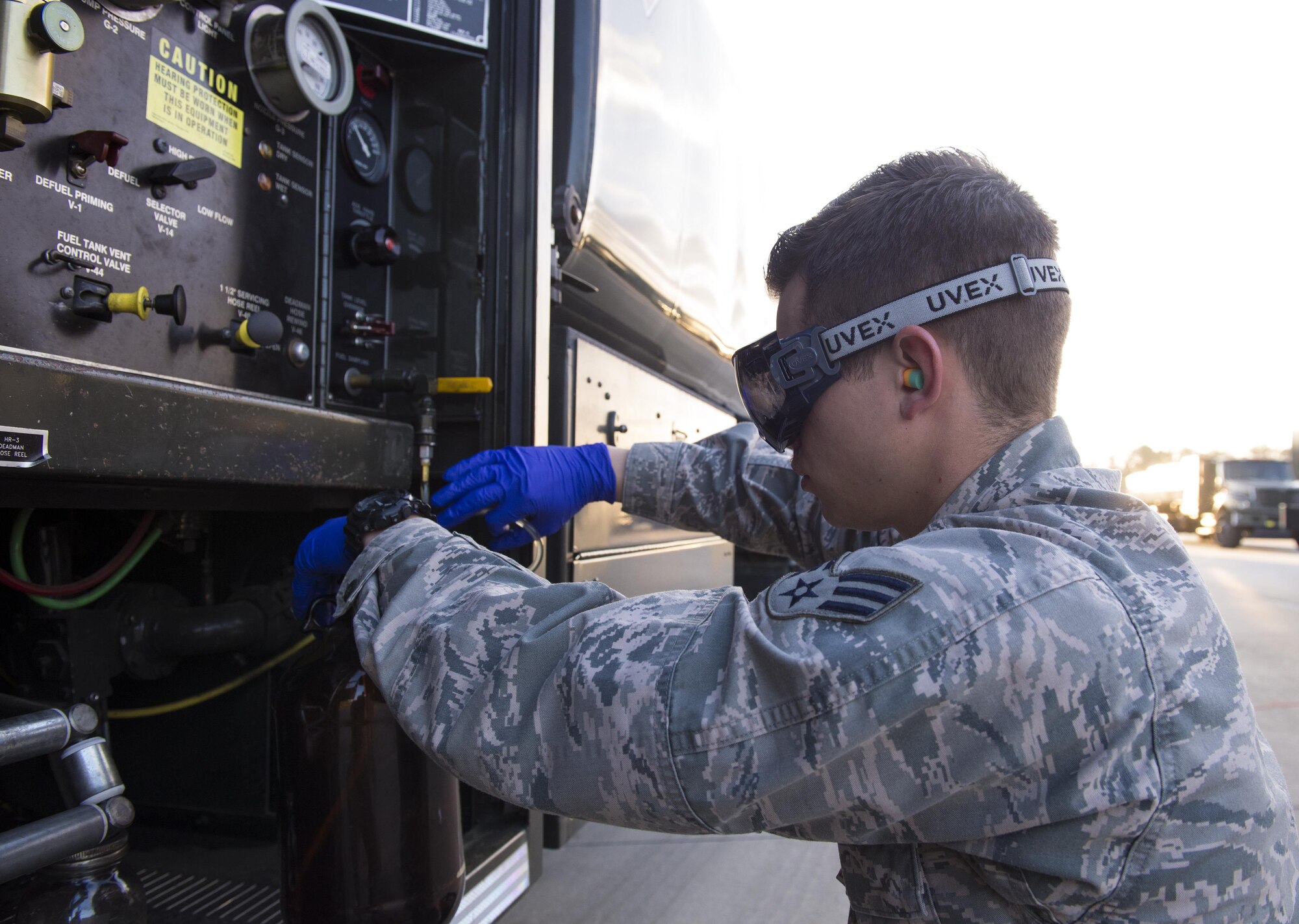 U.S. Air Force Senior Airman Zachary Stanley, 23d Logistics Readiness Squadron fuels laboratory technician, filters a fuel sample prior to testing, March 16, 2016, at Moody Air Force Base, Ga. As a part of the fuels management flight, laboratory technicians are responsible for the safety and cleanliness of the base’s approximate 9 million gallons of jet fuel. (U.S. Air Force photo by Airman 1st Class Greg Nash/Released)