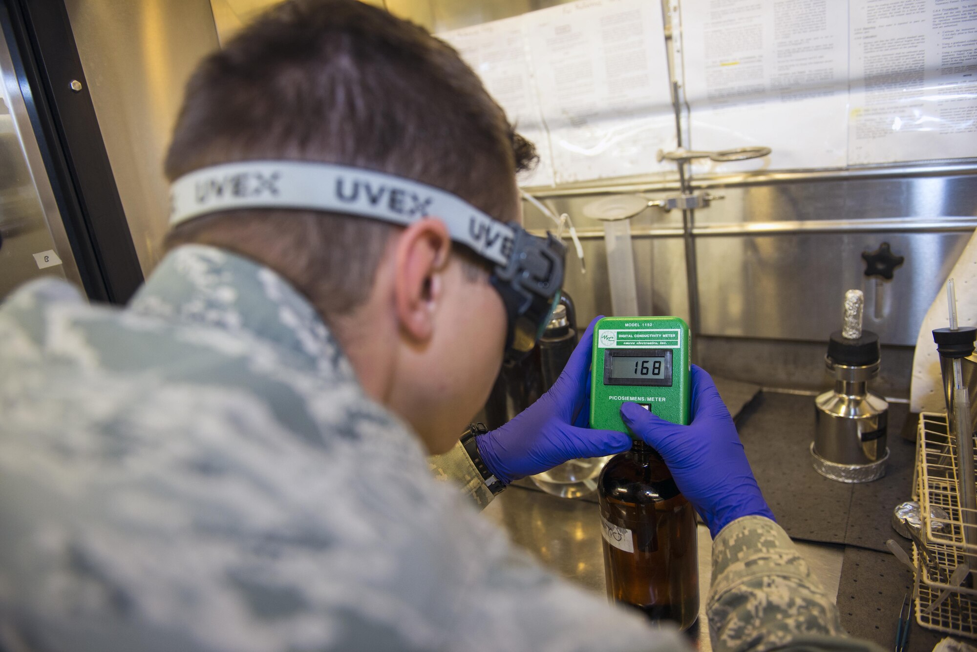 U.S. Air Force Senior Airman Zachary Stanley, 23d Logistics Readiness Squadron fuels laboratory technician, examines static display additive measurements during fuels sample testing, March 16, 2016, at Moody Air Force Base, Ga. This evaluation measures the fuel’s static buildup, which can be hazardous and adversely affect Moody’s flying mission.  
U.S. Air Force photo by Airman 1st Class Greg Nash/Released)

