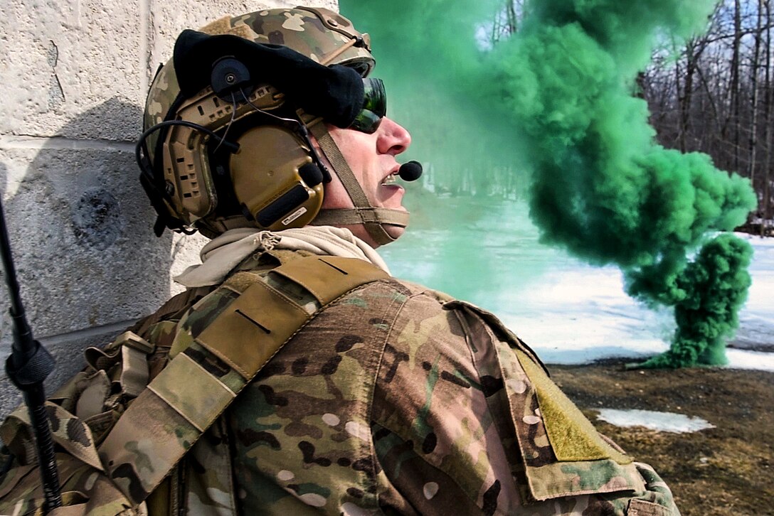 An airman participates in close air support training, which enhances the ability of airmen to identify a target and neutralize a threat, on Fort Drum, N.Y., March 5, 2016. The airman is assigned to the New York Air National Guard’s 274th Air Support Operations Squadron, which advises Army commanders on how to best use U.S. and NATO assets for close air support. Air National Guard photo by Master Sgt. Eric Miller
