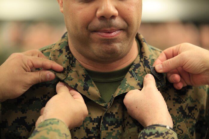 Lafayette, La.- Native Nester G. Antoine Jr., a Marine Military Policeman and Reaction Force Company Gunnery Sergeant, with Chemical Biological Incident Response Force (CBIRF), U.S. Marine Forces Command (MARFORCOM), is promoted (frocked) to the rank of master sergeant at Chemical Biological Incident Response Force (CBIRF), Indian Head, Md., March 1, 2016. When directed, CBIRF forward-deploys and/or responds with minimal warning to a chemical, biological, radiological, nuclear or high-yield explosive (CBRNE) threat or event in order to assist local, state, or federal agencies and the geographic combatant commanders in the conduct of CBRNE response or consequence management operations, providing capabilities for command and control; agent detection and identification; search, rescue, and decontamination; and emergency medical care for contaminated personnel. (Official USMC Photo by Sgt. Santiago G. Colon Jr./Released) 
