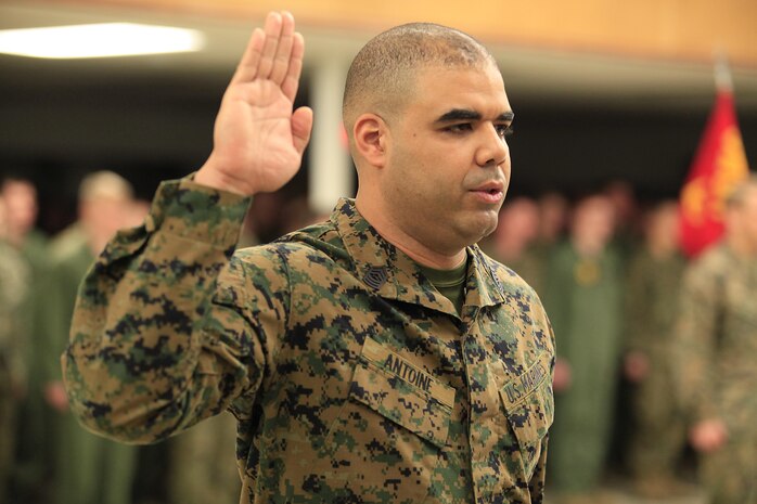 NAVAL SUPPORT FACILITY INDIAN HEAD, Md. – Lafayette, La.- Native Nester G. Antoine Jr., a Marine Military Policeman and Reaction Force Company Gunnery Sergeant, with Chemical Biological Incident Response Force (CBIRF), U.S. Marine Forces Command (MARFORCOM), is promoted (frocked) to the rank of master sergeant at Chemical Biological Incident Response Force (CBIRF), Indian Head, Md., March 1, 2016. When directed, CBIRF forward-deploys and/or responds with minimal warning to a chemical, biological, radiological, nuclear or high-yield explosive (CBRNE) threat or event in order to assist local, state, or federal agencies and the geographic combatant commanders in the conduct of CBRNE response or consequence management operations, providing capabilities for command and control; agent detection and identification; search, rescue, and decontamination; and emergency medical care for contaminated personnel. (Official USMC Photo by Sgt. Santiago G. Colon Jr./Released) 
