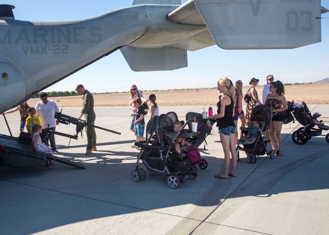 Spectators get an up-close look at military static display aircraft and vehicles during the Yuma Patriot Festival at Marine Corps Air Station Yuma, Ariz., Saturday, Feb. 27, 2016.