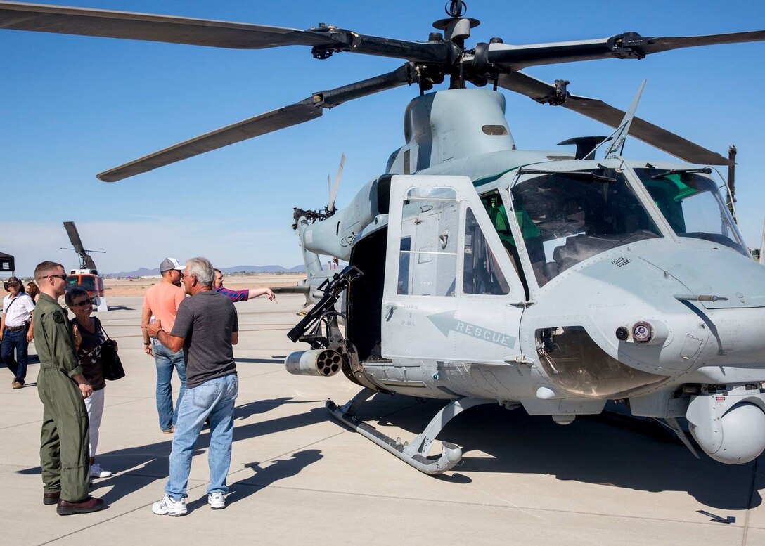 Spectators get an up-close look at military static display aircraft and vehicles during the Yuma Patriot Festival at Marine Corps Air Station Yuma, Ariz., Saturday, Feb. 27, 2016.