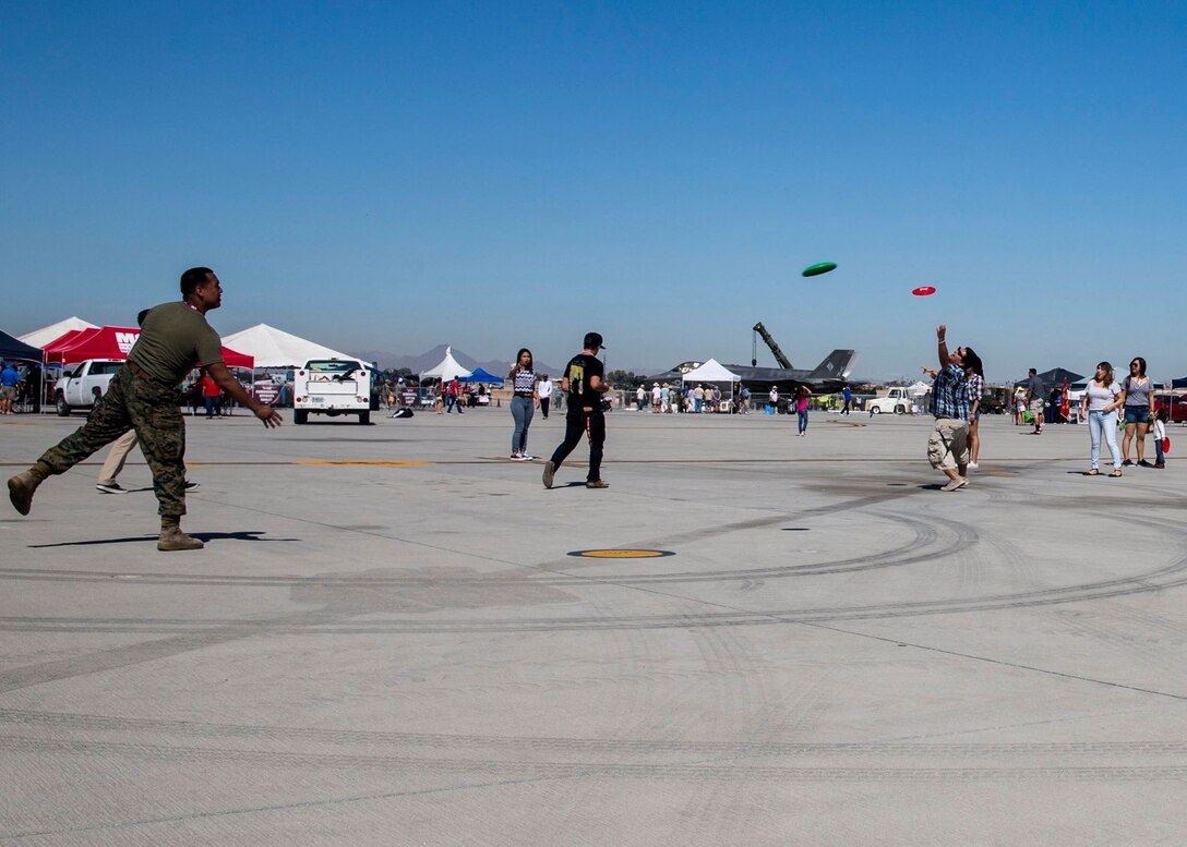 As part of the Yuma Patriot Festival, Marines interact with festival attendees during the event at Marine Corps Air Station Yuma, Ariz., Saturday, Feb. 27, 2016.