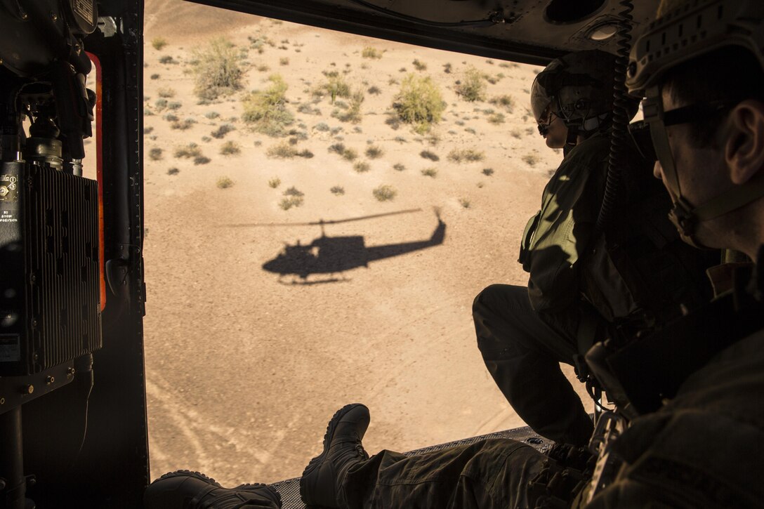 Marines with Search and Rescue, based out of Marine Corps Air Station Yuma, Ariz., conduct simulated medical and casualty evacuations in support of the Special Operations Terminal Air Control Course at Yuma Proving Ground, Friday, March 4, 2016.