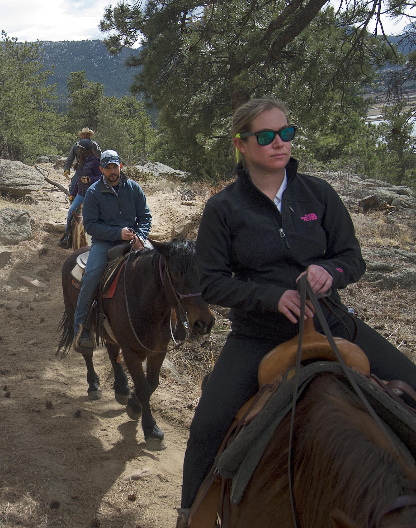 Senior Airman Rachel Silverberg and Joe Harvey, both with the 90th Force Support Squadron, ride near the Arapaho-Roosevelt National Forest above Estes Park, Colo., March 13, 2016. Harvey served as trip leader for an F.E. Warren Air Force Base’s Outdoor Recreation trip which brought a group of Airmen, retirees and dependents down from the Wyoming base for the chance to ride. (U.S. Air Force photo by R.J. Oriez)