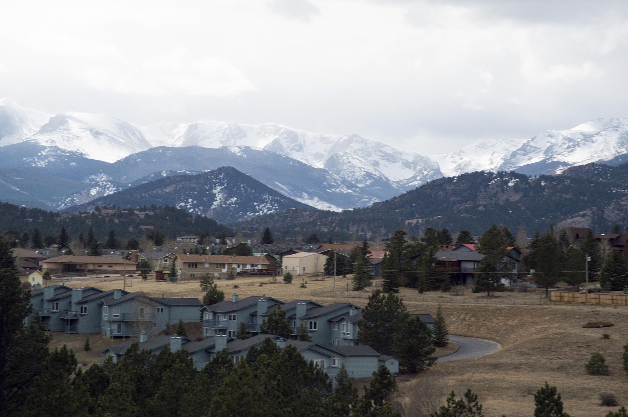 Estes Park, Colo., lies in a valley in front of the Continental Divide, March 13, 2016. This was one of the views members of an outdoor recreation trip from F.E. Warren Air Force Base, Wyo., got during a two-hour trail ride. (U.S. Air Force photo by R.J. Oriez)