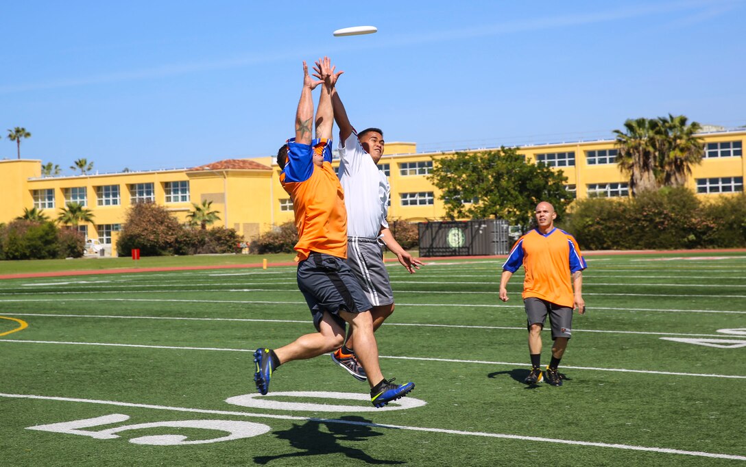 Participants in the Commanding General’s Cup Ultimate Frisbee Tournament compete against each other at the track and field area on Marine Corps Recruit Depot San Diego, March 15. Each match lasted for five minutes, and the team with the most points would move on in the tournament.