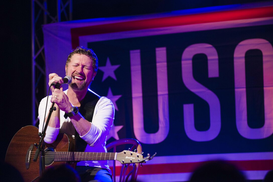Craig Morgan, a country music artist and Army veteran, performs for troops and family members at the USO spring tour on Camp Hansen, Japan, March 13, 2016. DoD photo by U.S. Army Staff Sgt. Sean K. Harp