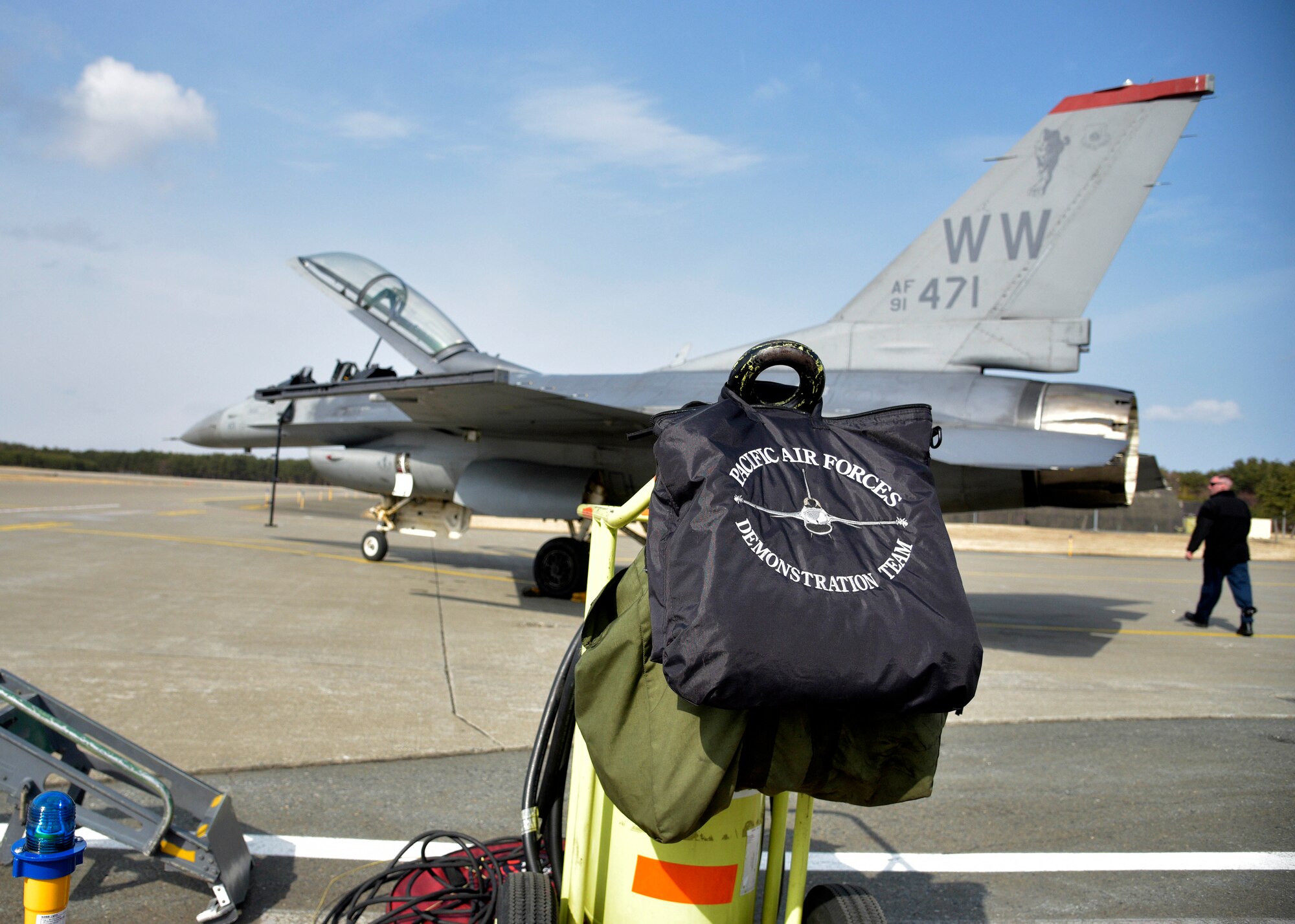 U.S. Air Force Maj. Austin Brown, the outgoing pilot with the Pacific Air Forces’ F-16 Demonstration Team, performs the role as a safety observer during the second demonstration flight of Capt. Richard Smeeding, the incoming pilot with the Pacific Air Forces Demonstration Team, at Misawa Air Base, Japan, March 10, 2016. The demonstration team is comprised of two pilots, who serve as the demonstration pilot and the safety observer. (U.S. Air Force photo by Senior Airman Deana Heitzman)
