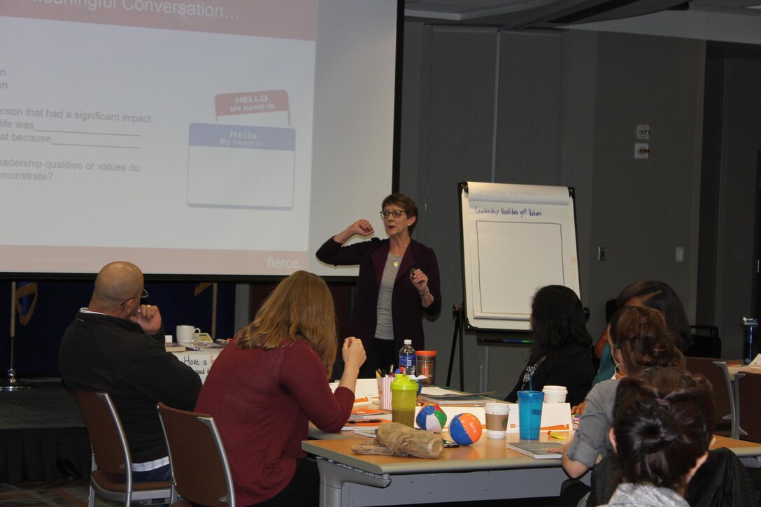 Molly Breazeale, fierce conversations trainer, instructs a Fierce Conversations course held March 15-16, 2016, at the Air Reserve Personnel Center on Buckley Air Force Base, Colo. Mid-level supervisors from throughout the ARPC gathered for a two-day intensive training course. The course helped managers ensure they are providing information to their subordinates, discerning the core meaning of communications from their subordinates and communicating the strategic vision of leadership in a way that employees can understand and apply. (U.S. Air Force photo/Maj. Heather Newcomb)