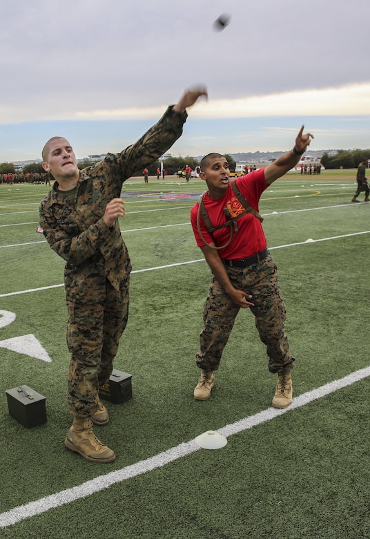 A recruit of Delta Company, 1st Recruit Training Battalion, throws a simulated grenade during the maneuver-under-fire portion of the combat fitness test at Marine Corps Recruit Depot San Diego, March 10. The course for this portion covers 75 yards and requires recruits to perform exercises such as sprints, ammunition can carries, fireman’s carry and throwing a simulated grenade at a marked target. Recruits were timed as they ran through the course and needed to finish it in less than 2 minutes and 14 seconds for maximum points.  Annually, more than 17,000 males recruited from the Western Recruiting Region are trained at MCRD San Diego. Delta Company is scheduled to graduate April 1.
