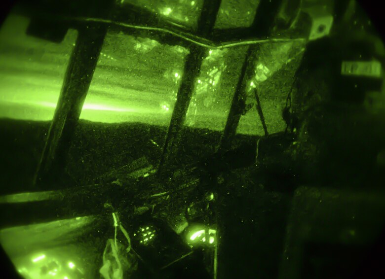 A pilot assigned to the 700th Airlift Squadron, Dobbins Air Reserve Base, Georgia, flies over the Nevada Test and Training Range during the last mission of Red Flag 16-2 at Nellis Air Force Base, Nev. March 11, 2016. Red Flag provided combat training in a degraded and operationally limited environment making the training missions as realistic as possible. (U.S. Air Force photo by Airman 1st Class Kevin Tanenbaum)  