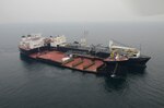 POHANG, South Korea (March 13, 2016) Maritime prepositioning force ship USNS GYSGT Fred W. Stockham (T-AK 3017) and Expeditionary Transfer Dock USNS Montford Point (T-ESD 1) performs  a skin-to-skin maneuver, March 13. The maneuver is conducted by two ships connecting side-by-side with one another at sea. In this instance, the Montford Point acted as a floating pier for a simulated offload. 
