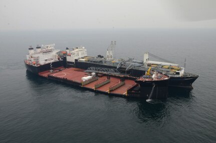 POHANG, South Korea (March 13, 2016) Maritime prepositioning force ship USNS GYSGT Fred W. Stockham (T-AK 3017) and Expeditionary Transfer Dock USNS Montford Point (T-ESD 1) performs  a skin-to-skin maneuver, March 13. The maneuver is conducted by two ships connecting side-by-side with one another at sea. In this instance, the Montford Point acted as a floating pier for a simulated offload. 