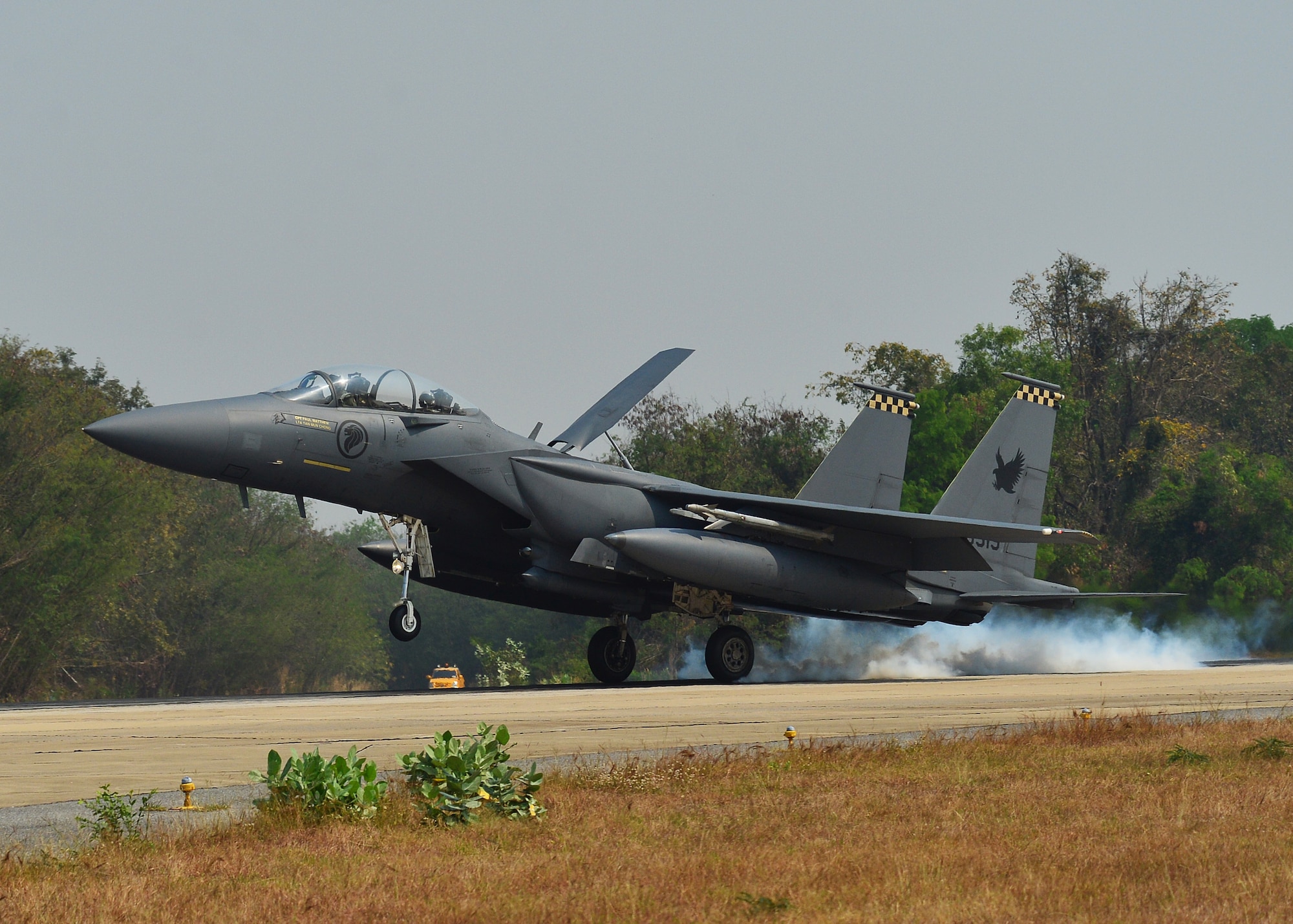 A Republic of Singapore Air Force F-15 Eagle lands during Exercise Cope Tiger 16, on Korat Royal Thai Air Force Base, Thailand, March 11, 2016. Exercise Cope Tiger 16 includes over 1,200 personnel from three countries and continues the growth of strong, interoperable and beneficial relationships within the Asia-Pacific Region, while demonstrating U.S. capability to project forces strategically in a combined, joint environment. (U.S. Air Force Photo by Tech Sgt. Aaron Oelrich/Released)