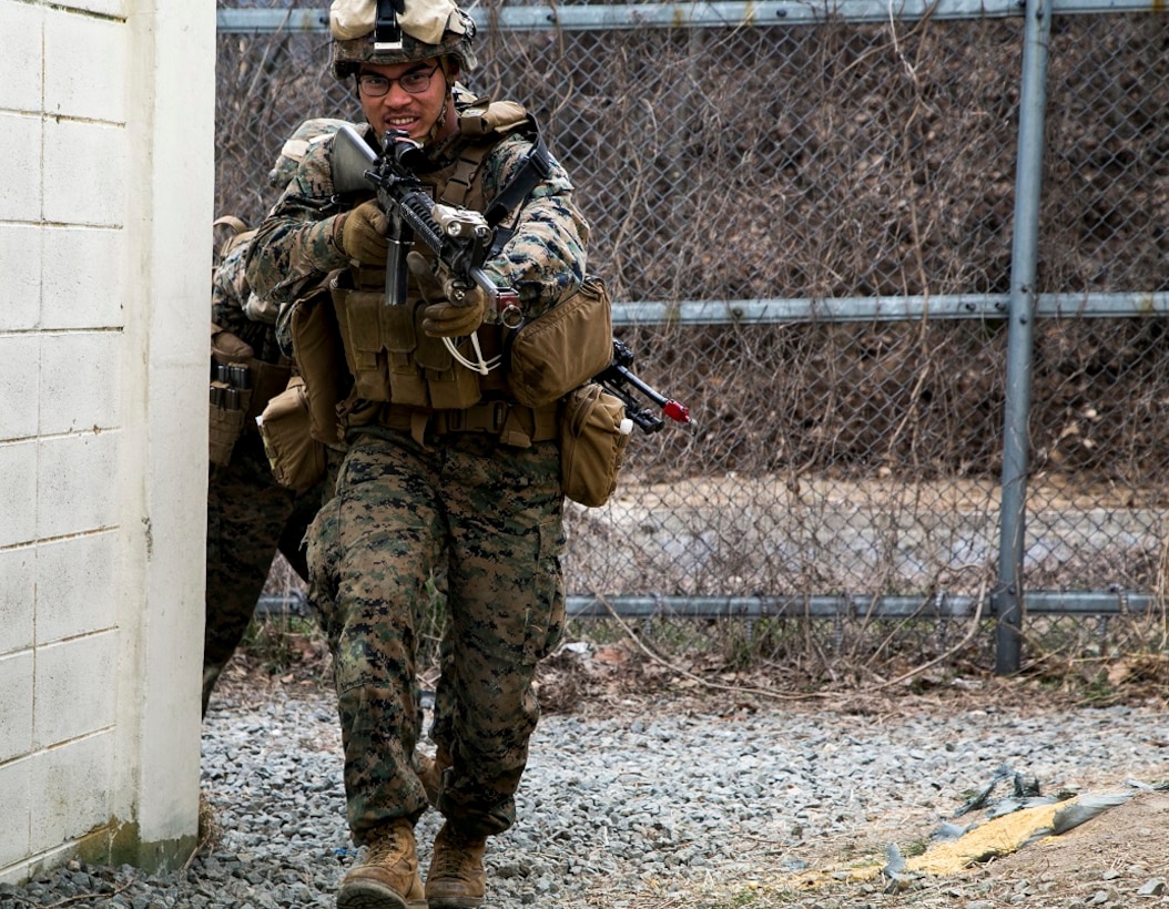 U.S. Marine Lance Cpl. Michael Haller with the 13th Marine Expeditionary Unit, leads his team through a simulated town while conducting assaults in an urban terrain training facility, March 14, 2016, during Exercise Ssang Yong 16 in Pohang, South Korea. Exercise Ssang Yong 16 is a biennial military exercise focused on strengthening the amphibious landing capabilities of the Republic of Korea, the U.S., New Zealand and Australia. (U.S. Marine Corps photo by Sgt. Briauna Birl/RELEASED)