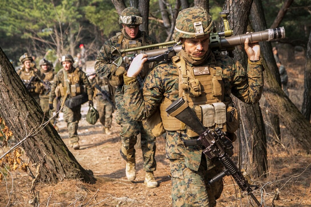 U.S. Marines with the 13th Marine Expeditionary Unit move into position on the perimeter of an urban terrain training facility, March 14, 2016, during Exercise Ssang Yong 16 in Pohang, South Korea. Ssang Yong 16 is a biennial military exercise focused on strengthening the amphibious landing capabilities of the Republic of Korea, the U.S., New Zealand and Australia.