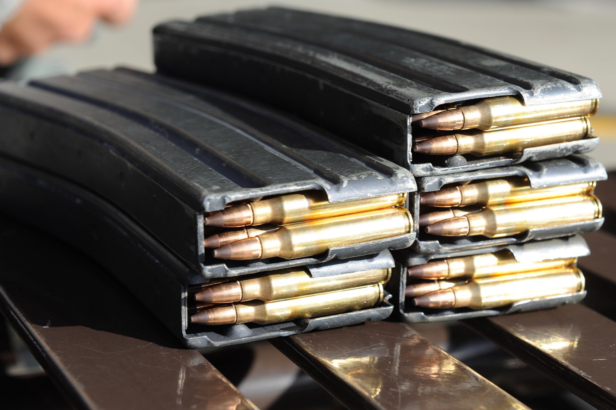 M-4 Carbine magazines are pre-filled prior to entering the qualification course at Langley Air Force Base, Va., March 8, 2016. Airmen must qualify on specific weapons which they may need to carry while on duty, before deploying or prior to certain permanent changes of station. (U.S. Air Force photo by Senior Airman Brittany E. N. Murphy)