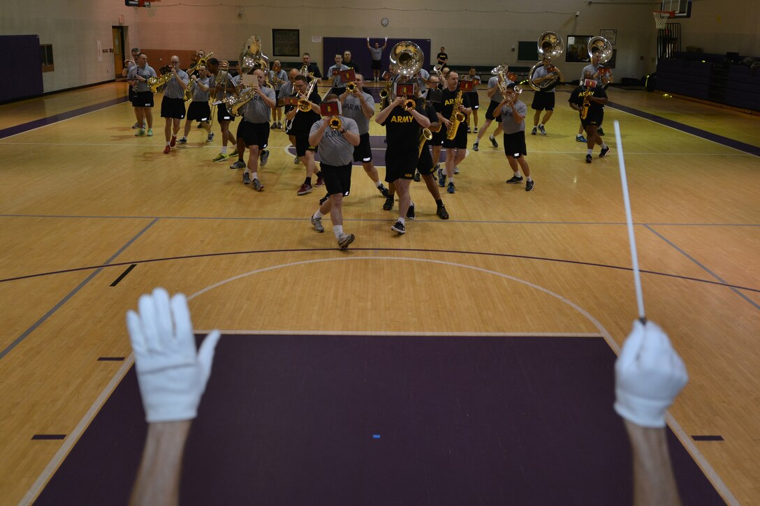 U.S. Soldiers from the U.S. Army Training and Doctrine Command (TRADOC) band rehearse for their upcoming performances at the Virginia International Tattoo in Norfolk, Va., at Fort Eustis, Va., March 10, 2016. This international event is one of the TRADOC band’s largest performances of the year, reaching live audiences of more than 35,000 people.  (U.S. Air Force photo by Staff Sgt. Natasha Stannard)