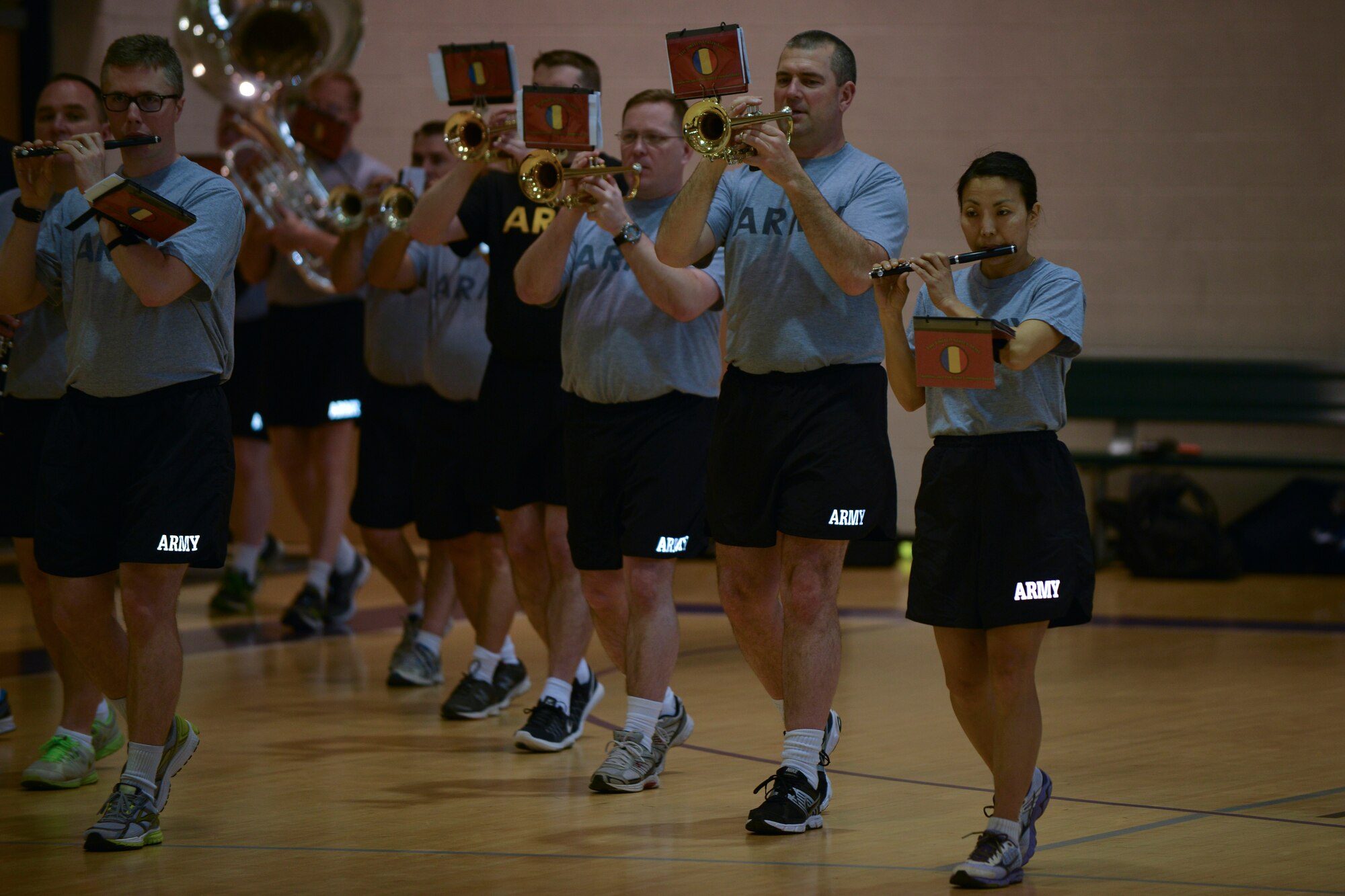 The U.S. Army Training and Doctrine Command (TRADOC) band Soldiers practice marching movements for an upcoming show in Norfolk, Va., at Fort Eustis, Va., March 10, 2016.  The band’s performances aim to foster Soldier and family morale, tell the Army story to the civilian community, provide support for recruiting initiatives, conduct educational outreach and support the TRADOC messages. (U.S. Air Force photo by Staff Sgt. Natasha Stannard)
