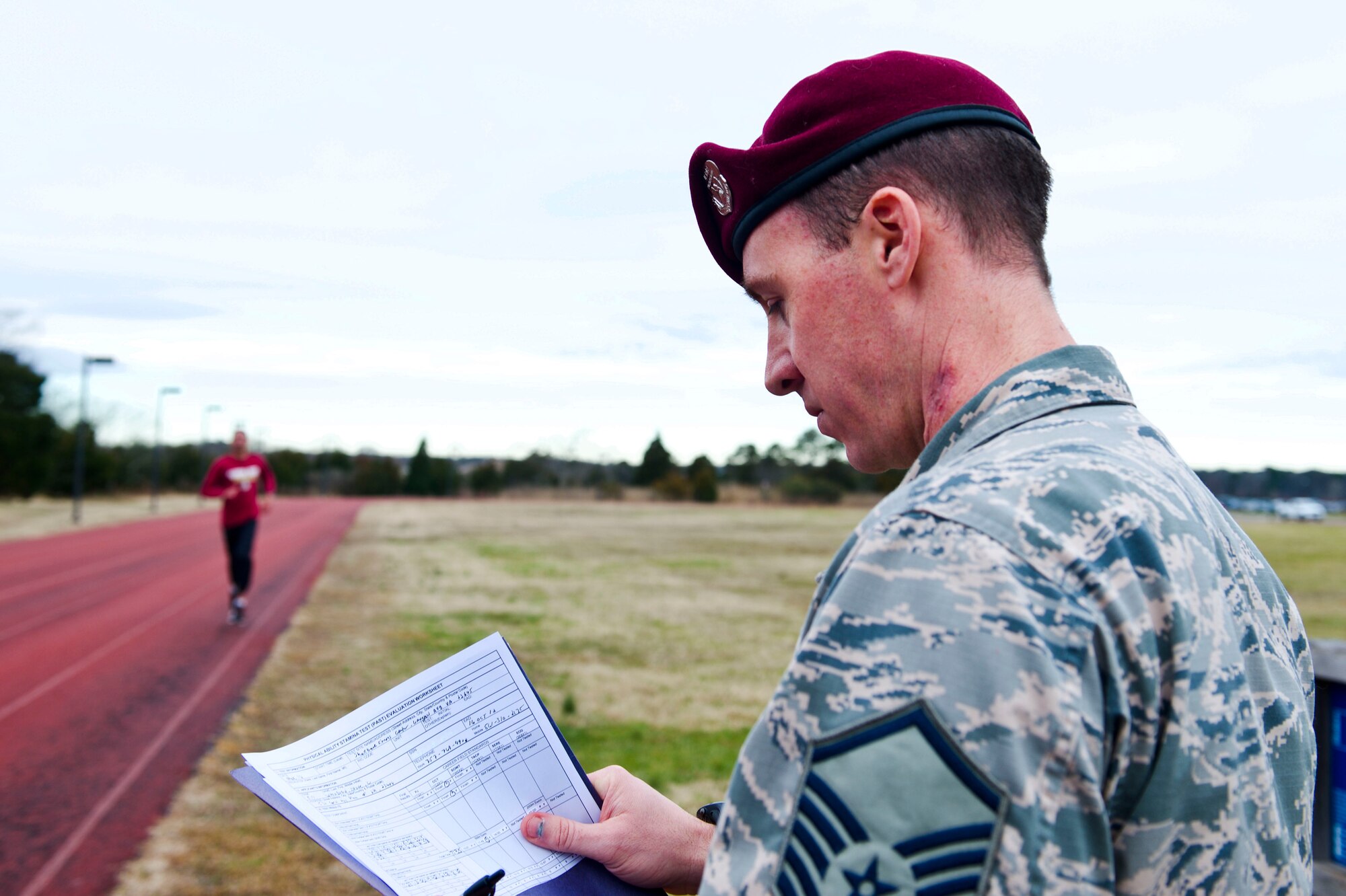 U.S. Air Force Master Sgt. Travis Shaw, the pararescue medical program manager at Air Combat Command, evaluates Senior Airman D’Vonte Washburn, an aircraft maintenance scheduler with the 1st Maintenance Group, during a Physical Aptitude Stamina Test (PAST) at Langley Air Force Base, Va., March 3, 2016. Washburn tested to meet the requirements for the Combat Control career field. To become a combat controller, candidates endure up to 24 months of rigorous training in numerous courses around the United States. (U.S. Air Force photo by Airman 1st Class Derek Seifert)