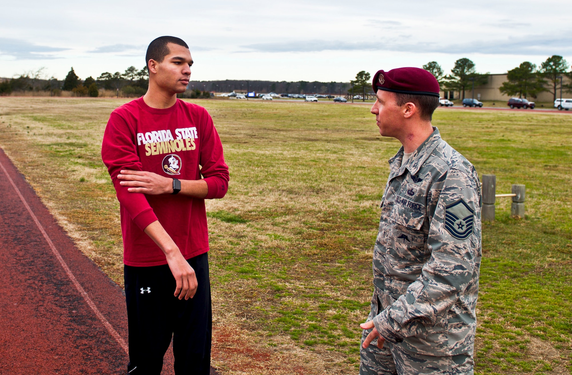 U.S. Air Force Master Sgt. Travis Shaw, the pararescue medical program manager at Air Combat Command, explains the required run time for the Physical Aptitude Stamina Test (PAST) to Senior Airman D’Vonte Washburn, an aircraft maintenance scheduler with the 1st Maintenance Group, at Langley Air Force Base, Va., March 3, 2016. The PAST has different time and repetition requirements for the special operations career field the Airman is pursuing such as combat control or pararescue. Each exercise in the PAST is pass or fail, ensuring the candidates are meeting the minimum requirements for the desired career field. (U.S. Air Force photo by Airman 1st Class Derek Seifert) 
