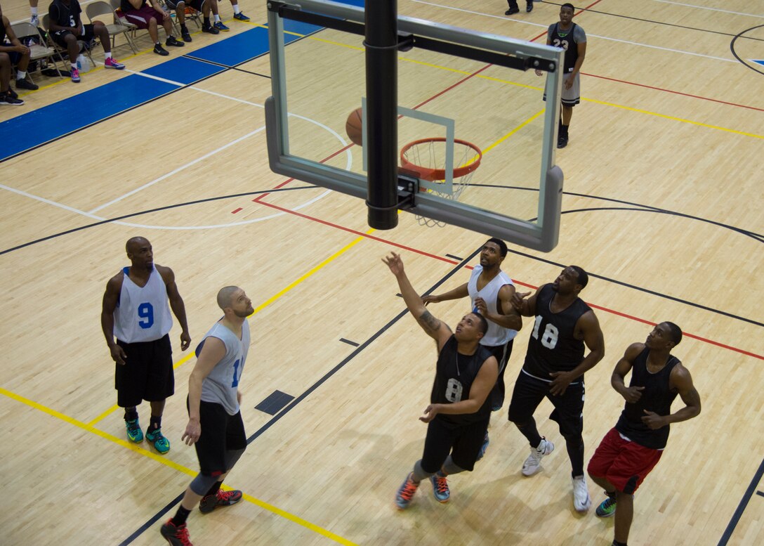 Jerome Becks, forward for the Fort Eustis All-Stars, finishes a lay-up during the Joint Base Langley-Eustis all-star basketball game at Langley Air Force Base, Va., March. 9, 2016. Becks named himself as the game’s most valuable player, an award typically bestowed upon the best-performing player in a championship game. (U.S. Air Force photo by Staff Sgt. J.D. Strong II)